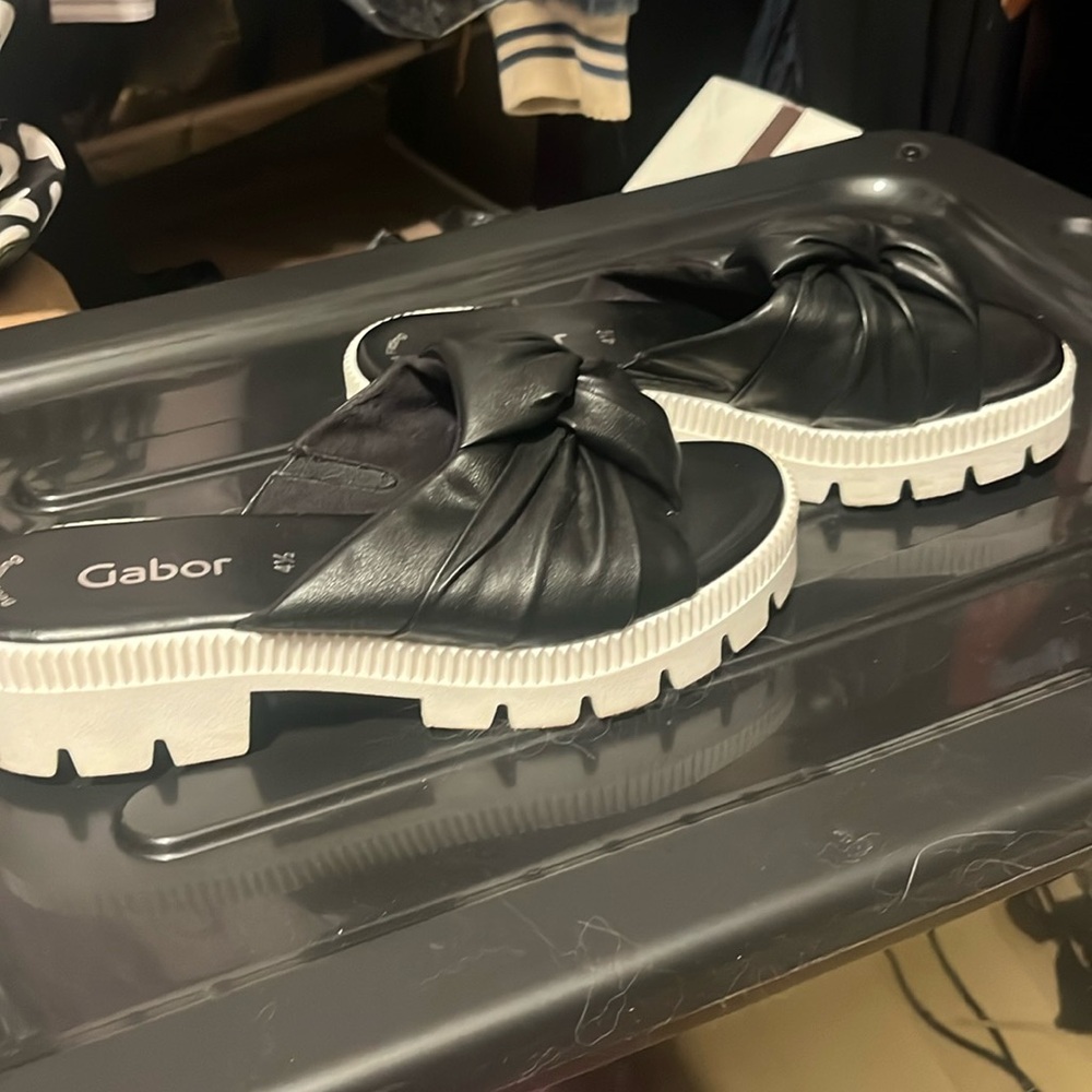 Black leather slides
